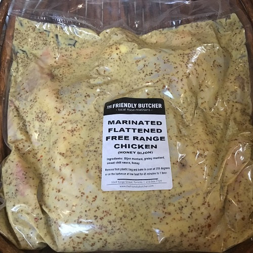 Sealed bag of marinated flattened free range chicken, honey dijon
